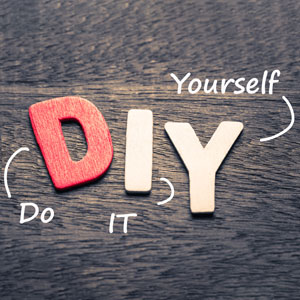 DIY (Do It Yourself) spelled out with wooden letters.
